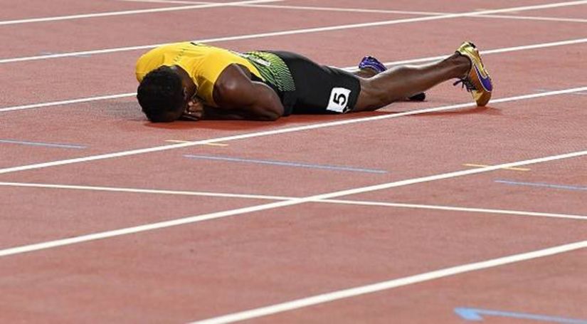 Fiasco Bolt! Marele atlet jamaican s-a accidentat în ultima sa cursă, finala de 4×100 metri de la Mondialele de atletism câștigată de Marea Britanie
