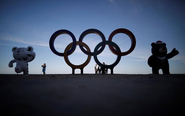 North, South Korea begin talks as Winter Olympics help break ice